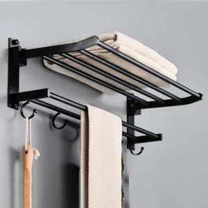 etagere porte serviette noir en acier inoxydable avec des serviettes etendu